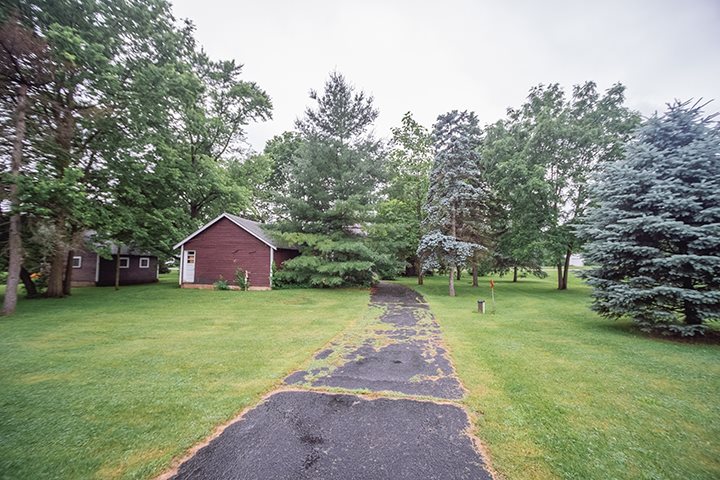 2829 Rice Avenue Rockford, IL 61101 - Photo 18 of 21 a view of a fire pit with a big yard
