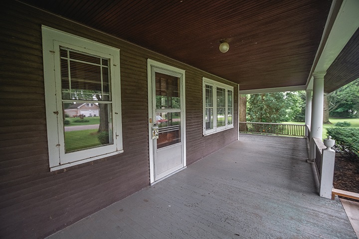 2829 Rice Avenue Rockford, IL 61101 - Photo 2 of 21 a view of a porch with a table and chairs