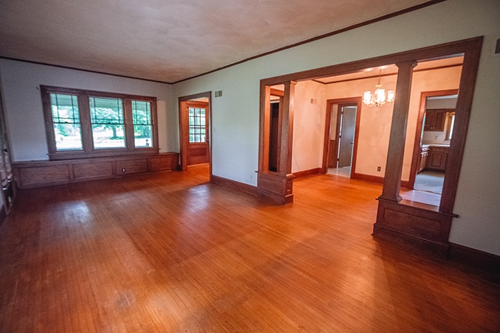 2829 Rice Avenue Rockford, IL 61101 - Photo 4 of 21 a view of an empty room with wooden floor and a window