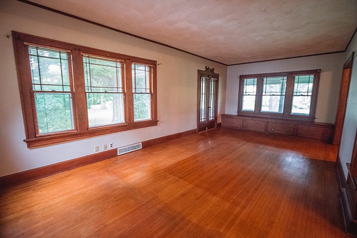 2829 Rice Avenue Rockford, IL 61101 - Photo 5 of 21 an empty room with wooden floor and windows