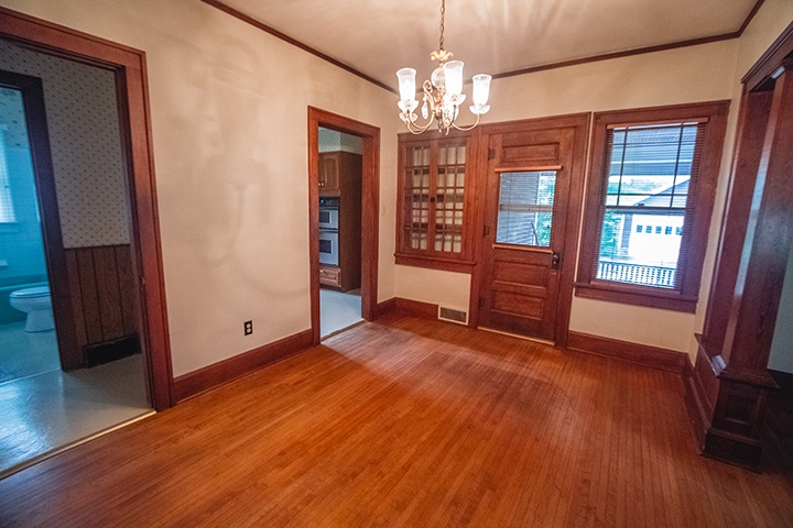 2829 Rice Avenue Rockford, IL 61101 - Photo 7 of 21 a view of a room with wooden floor and staircase