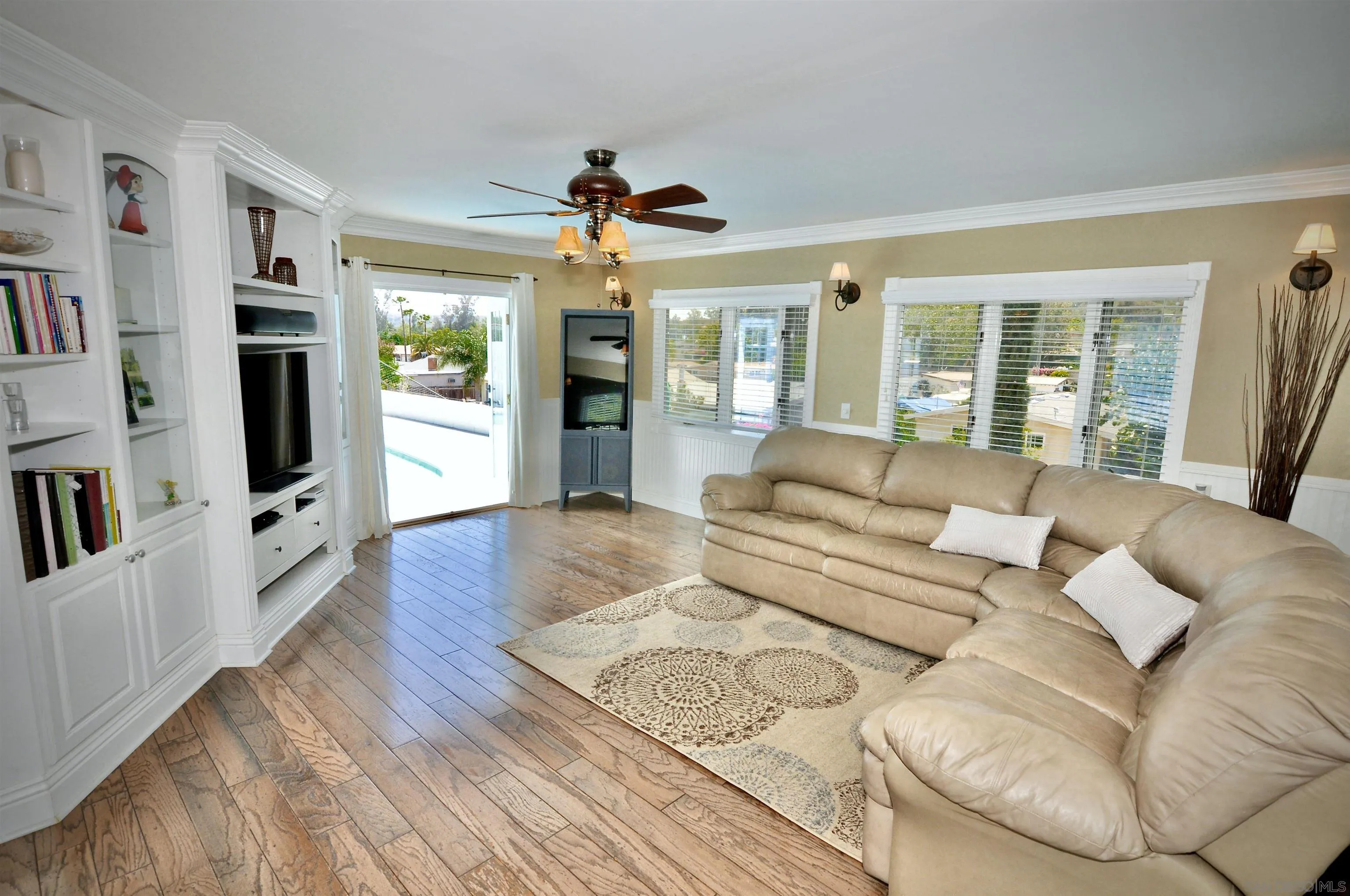 13328 Frame Road Poway, CA 92064 - Photo 8 of 29 a living room with furniture and a flat screen tv