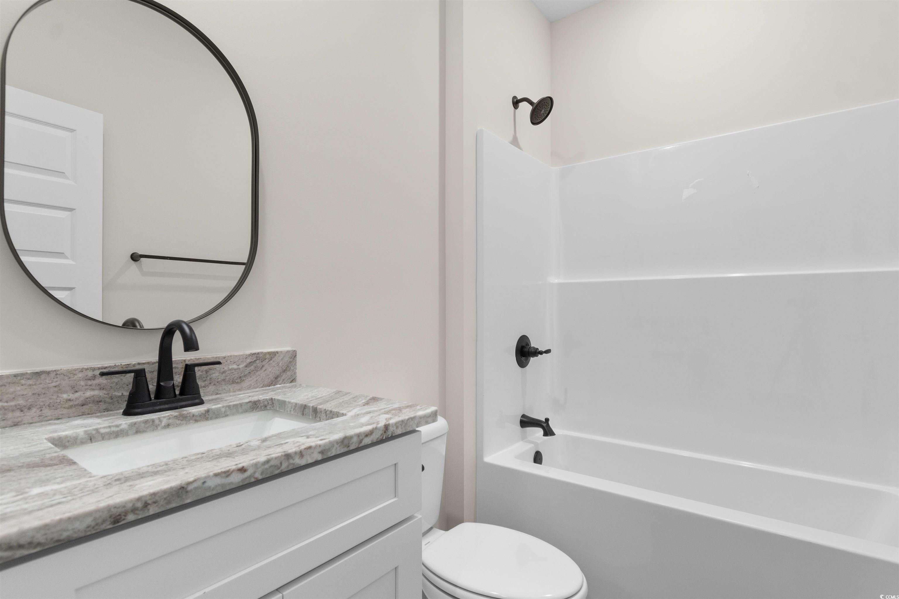 146 Temple Drive Aynor, SC 29511 - Photo 21 of 40 Bathroom featuring bathtub / shower combination and vanity