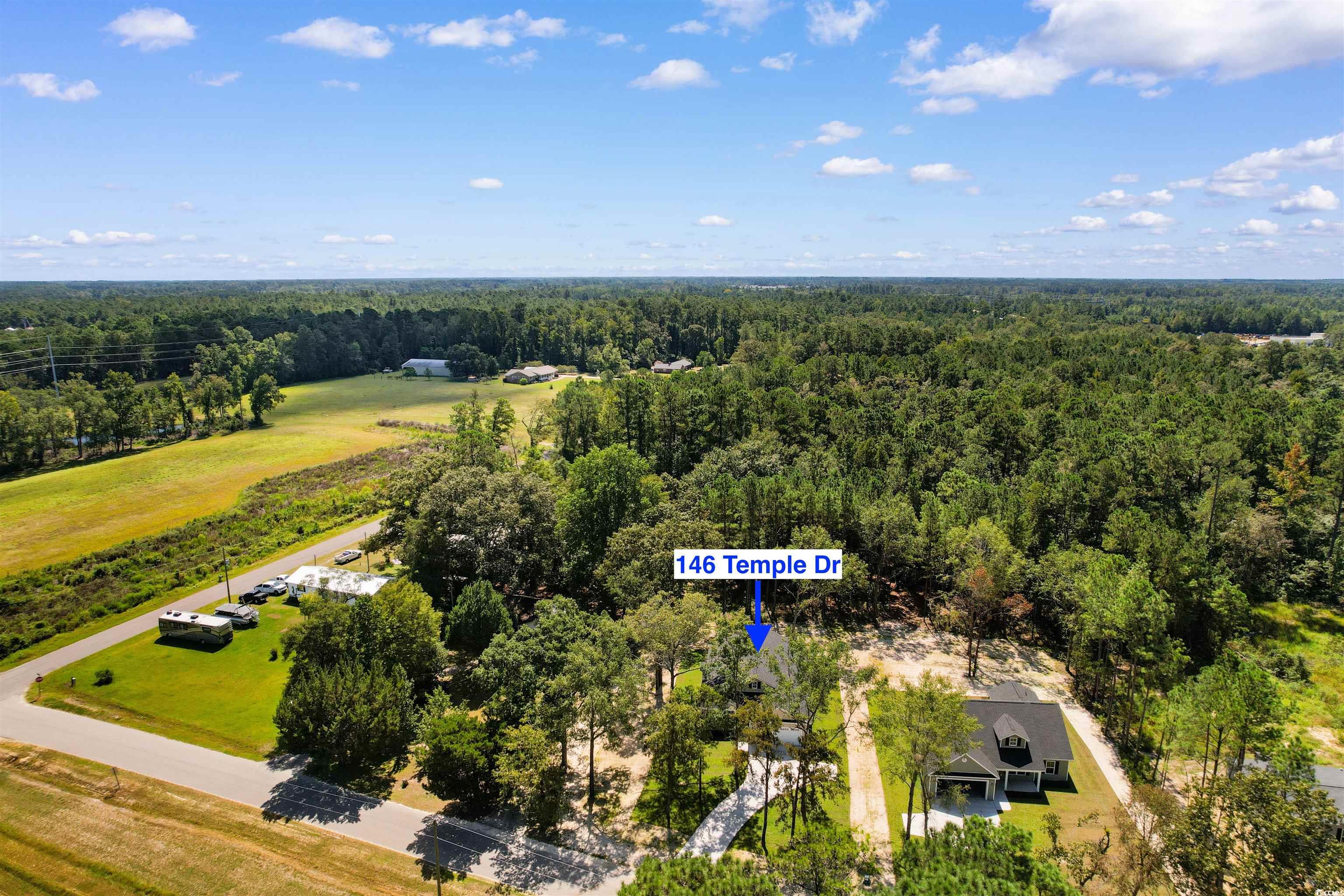 146 Temple Drive Aynor, SC 29511 - Photo 35 of 40 Drone / aerial view of a forest