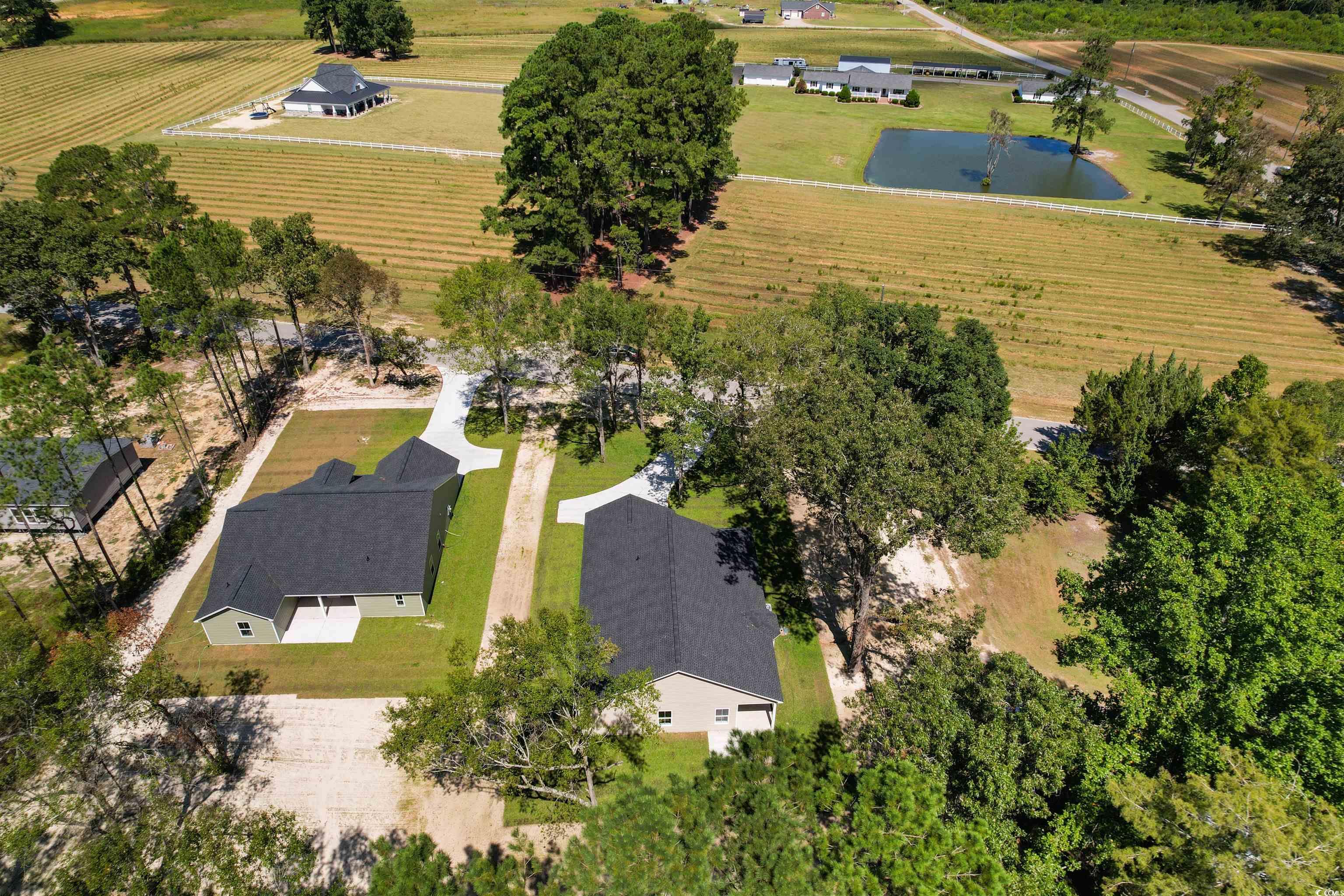 146 Temple Drive Aynor, SC 29511 - Photo 38 of 40 View of rural area featuring a nearby body of water and farmland