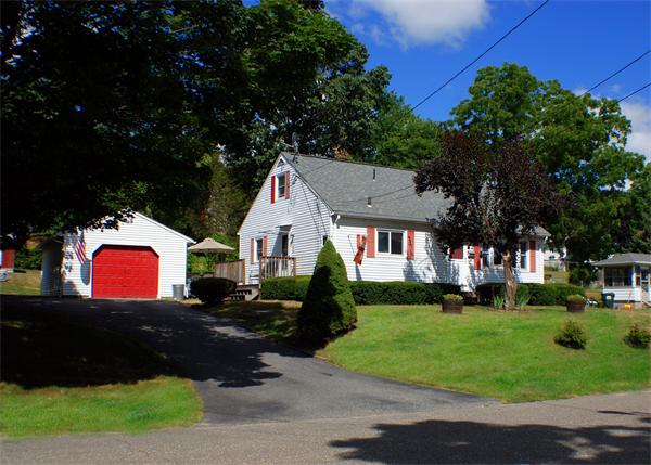 16 Sibley Street Three Rivers, MA 01080 - Photo 1 of 27 a front view of a house with a garden