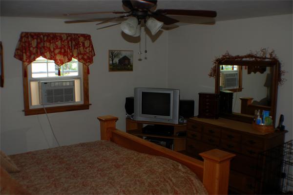 16 Sibley Street Three Rivers, MA 01080 - Photo 16 of 27 a bedroom with furniture and window