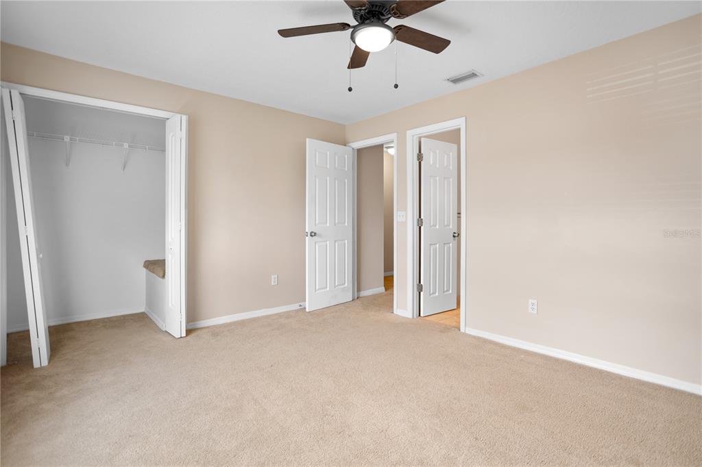 7337 Cedar Creek Court, Unit 75 Winter Park, FL 32792 - Photo 18 of 26 a view of empty room with ceiling fan