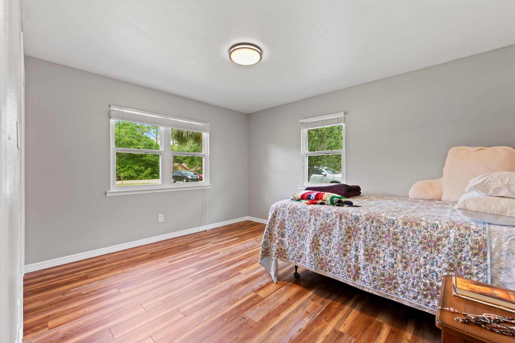 1120 Tallokas Road Crestview, FL 32536 - Photo 19 of 55 a bedroom with bed and a window