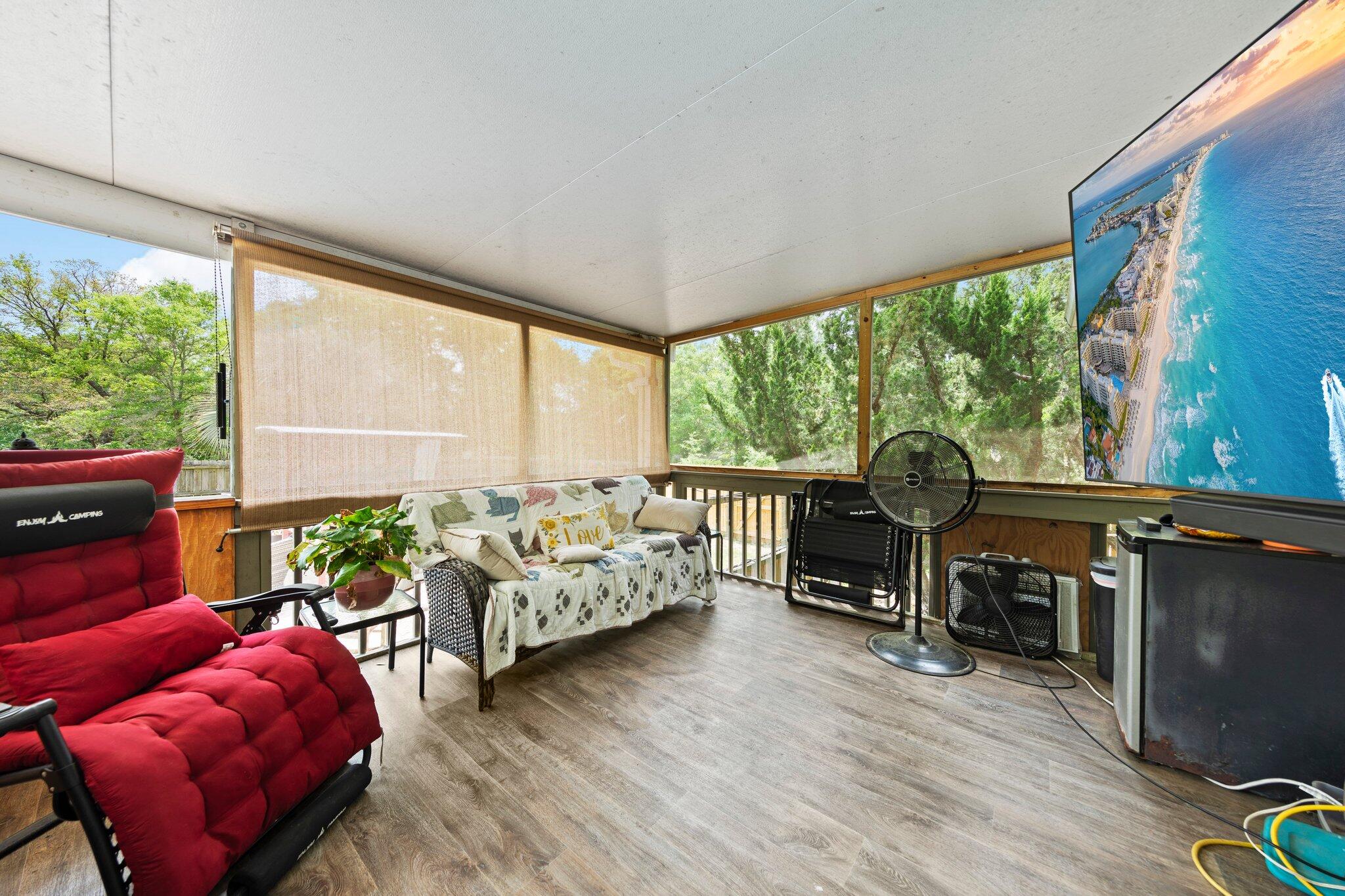 1120 Tallokas Road Crestview, FL 32536 - Photo 29 of 55 a living room with furniture and a large window