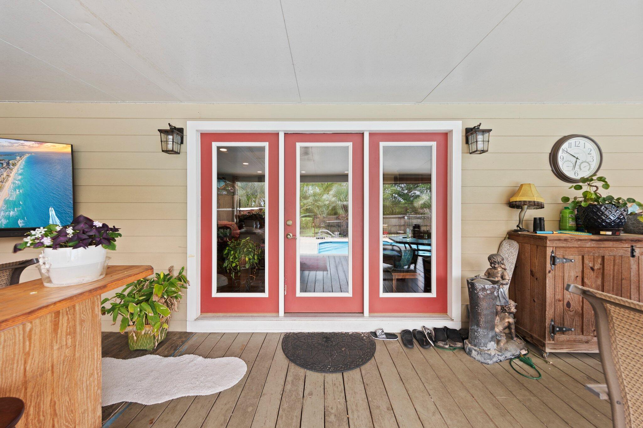 1120 Tallokas Road Crestview, FL 32536 - Photo 31 of 55 a view of a room with furniture window and wooden floor