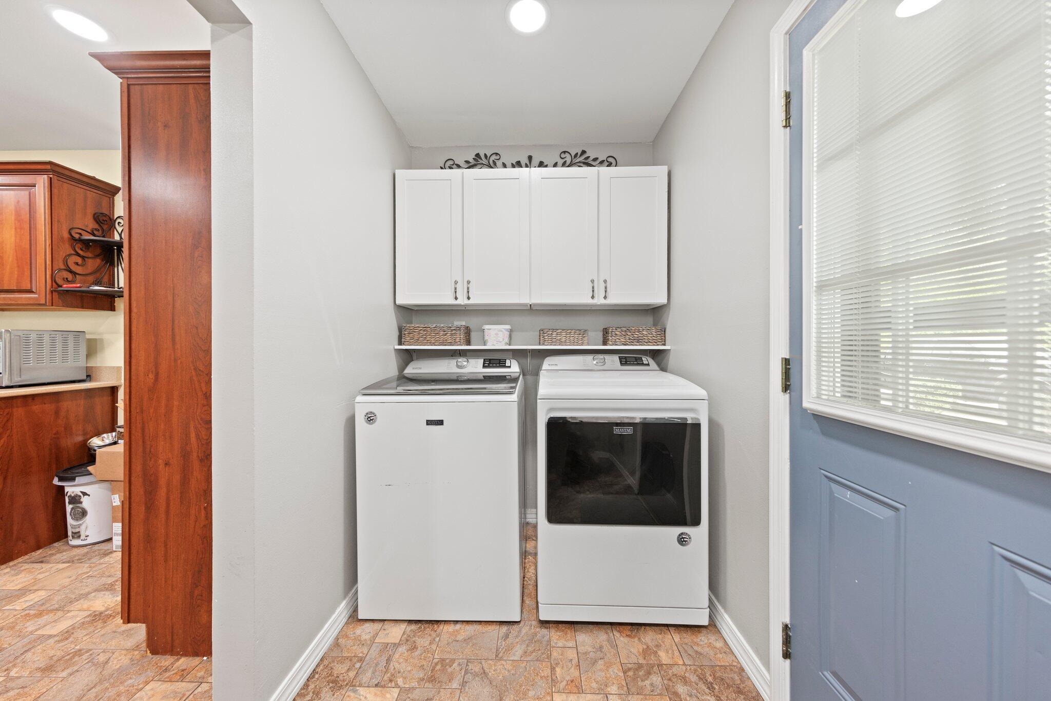1120 Tallokas Road Crestview, FL 32536 - Photo 9 of 55 a view of a kitchen with washer and dryer