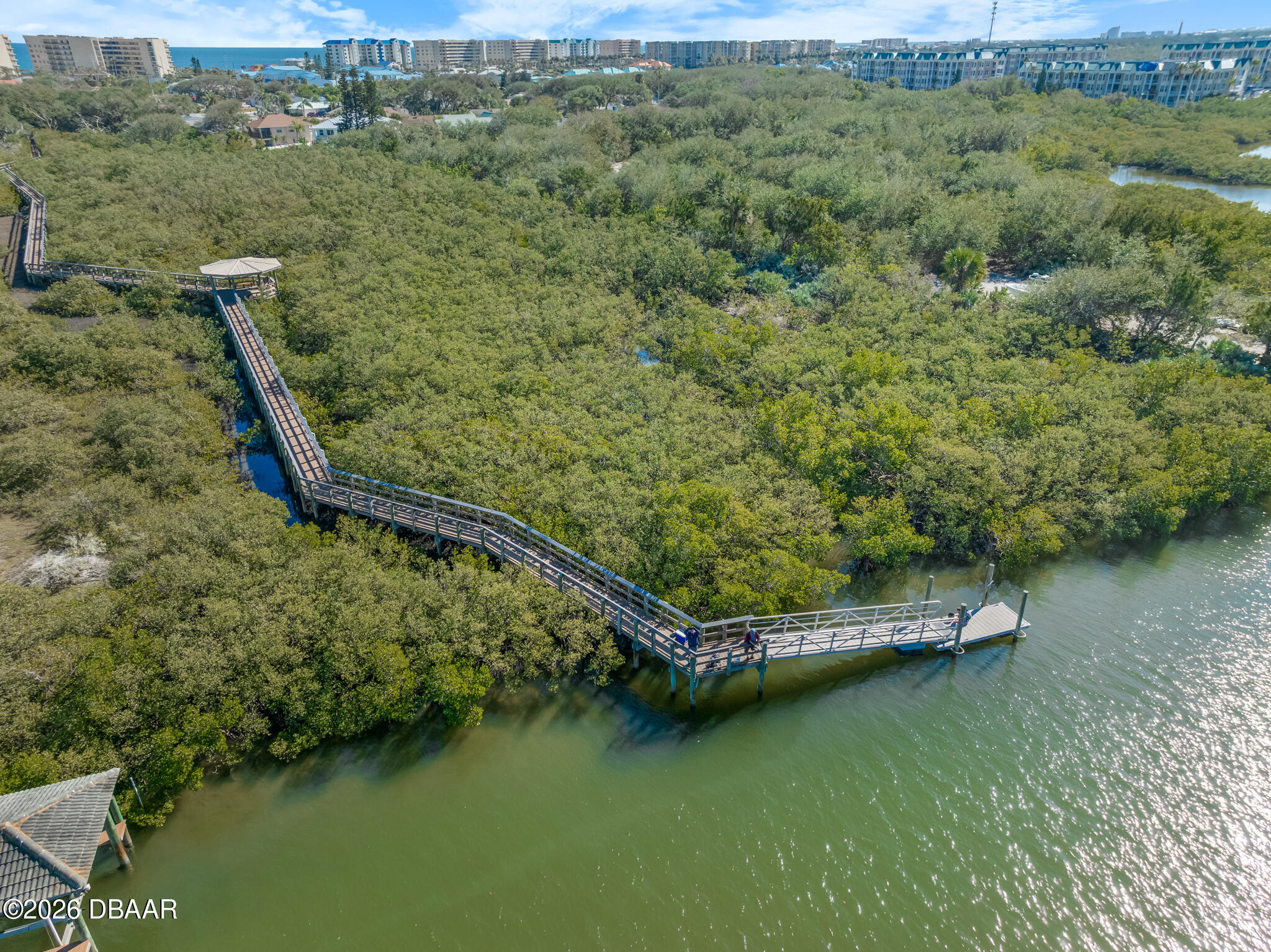 4863 South Atlantic Avenue Ponce Inlet, FL 32127 - Photo 21 of 21 a view of a lake with a mountain