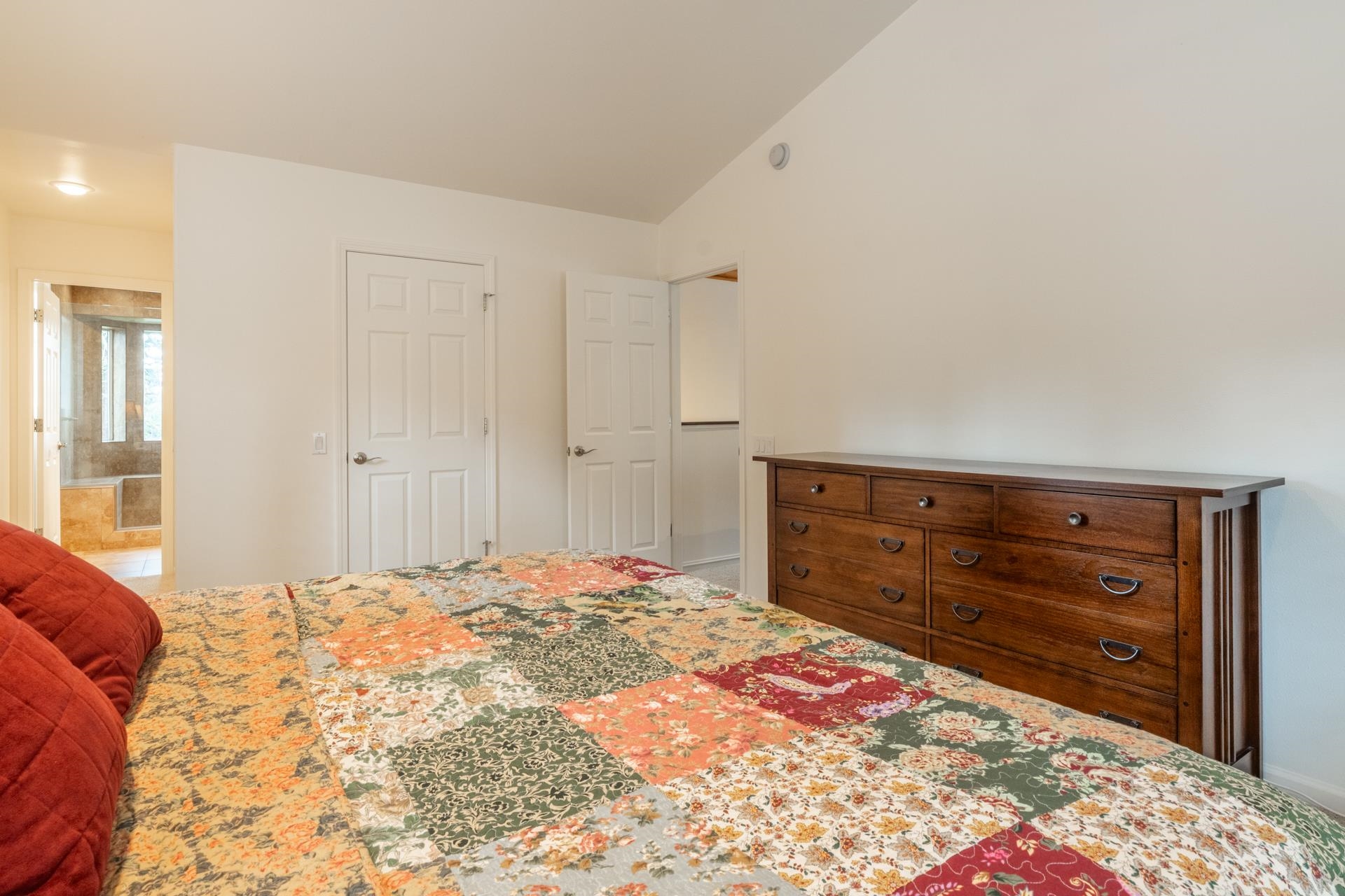 236 Davison Road Mammoth Lakes, CA 93546 - Photo 18 of 49 a bedroom with a bed and a dresser