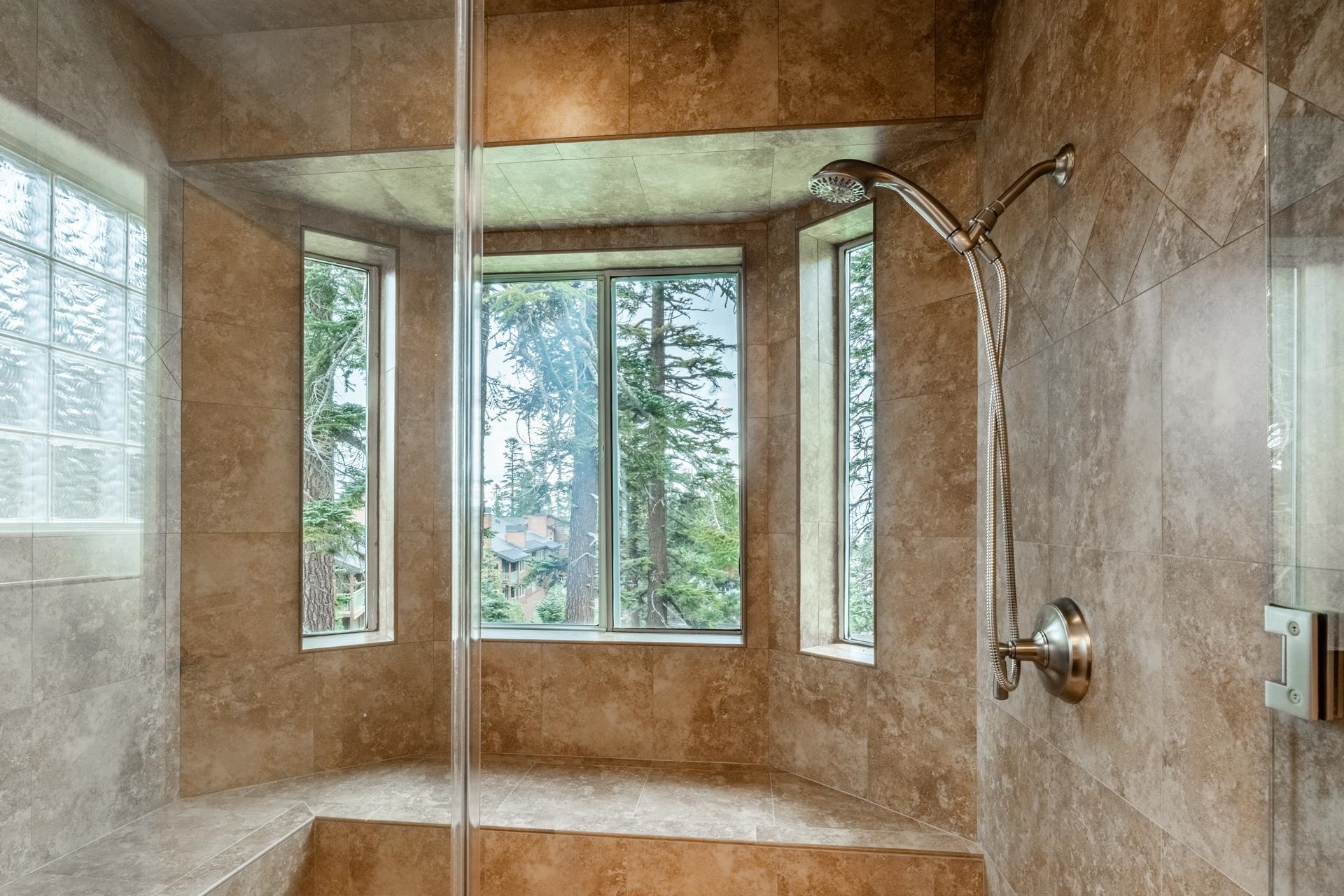 236 Davison Road Mammoth Lakes, CA 93546 - Photo 22 of 49 a bathroom with a shower and a window