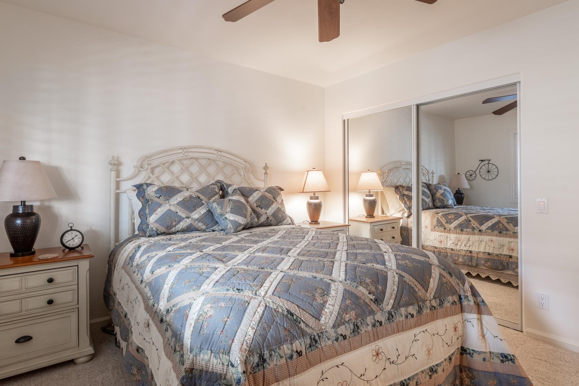 236 Davison Road Mammoth Lakes, CA 93546 - Photo 25 of 49 a bedroom with double bed a lamp and a closet