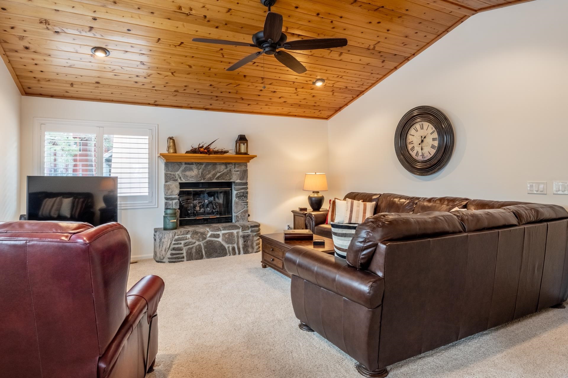 236 Davison Road Mammoth Lakes, CA 93546 - Photo 3 of 49 a living room with furniture and a fireplace