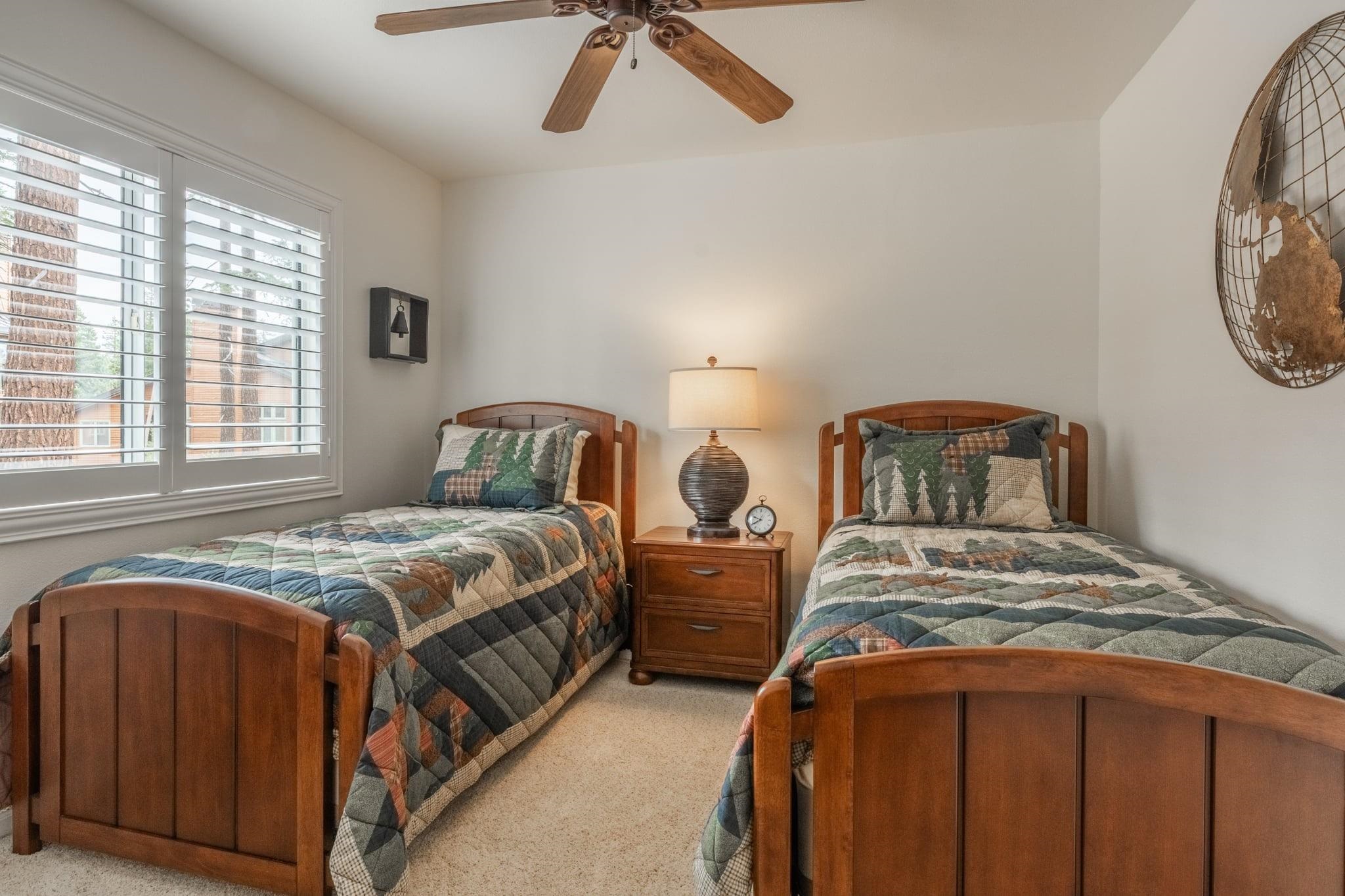 236 Davison Road Mammoth Lakes, CA 93546 - Photo 31 of 49 a bedroom with two beds and a window