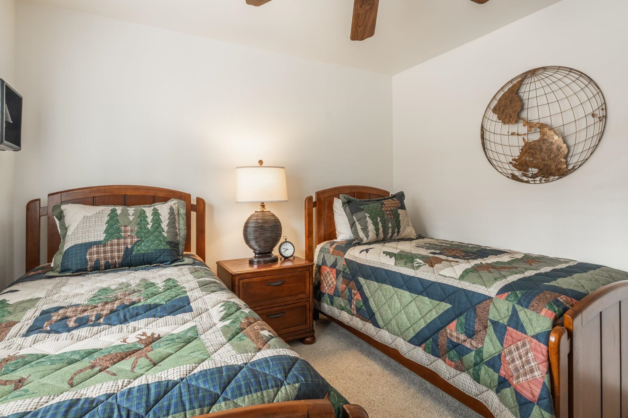 236 Davison Road Mammoth Lakes, CA 93546 - Photo 32 of 49 a bedroom with a bed a mirror and lamp