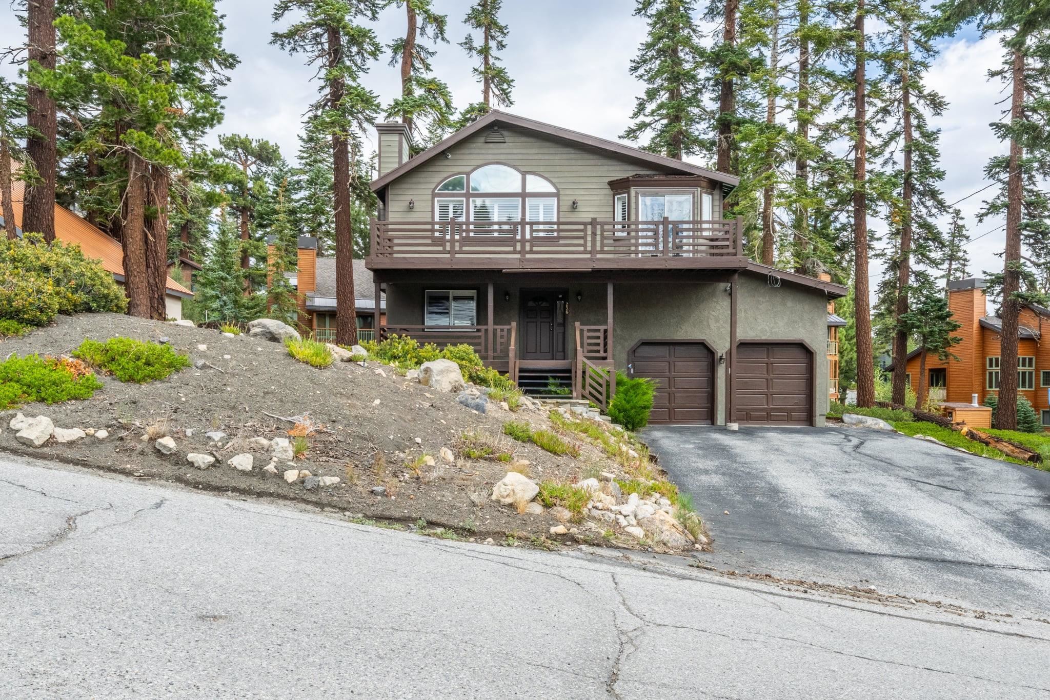 236 Davison Road Mammoth Lakes, CA 93546 - Photo 42 of 49 a front view of a house with garden