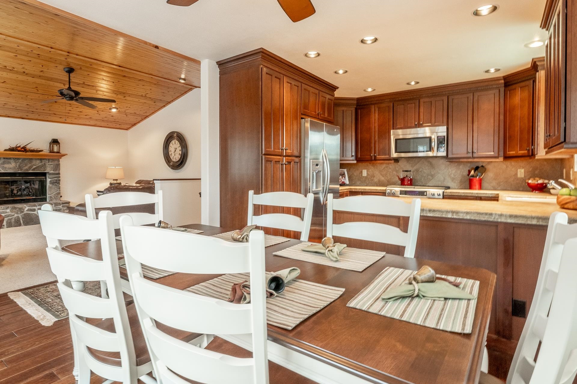 236 Davison Road Mammoth Lakes, CA 93546 - Photo 6 of 49 a kitchen with a sink chairs and cabinets