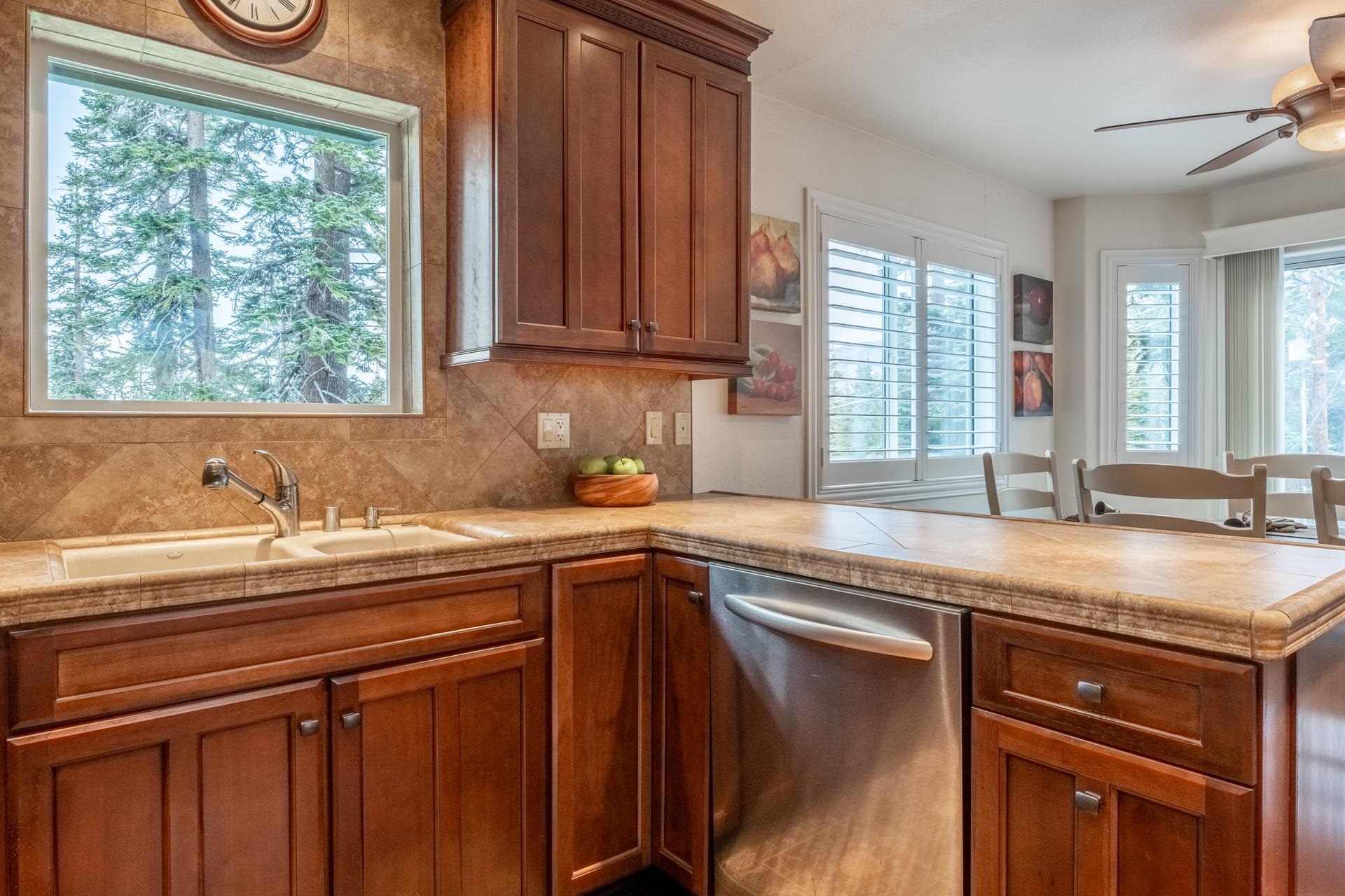 236 Davison Road Mammoth Lakes, CA 93546 - Photo 10 of 49 a kitchen with stainless steel appliances granite countertop a sink stove and cabinets