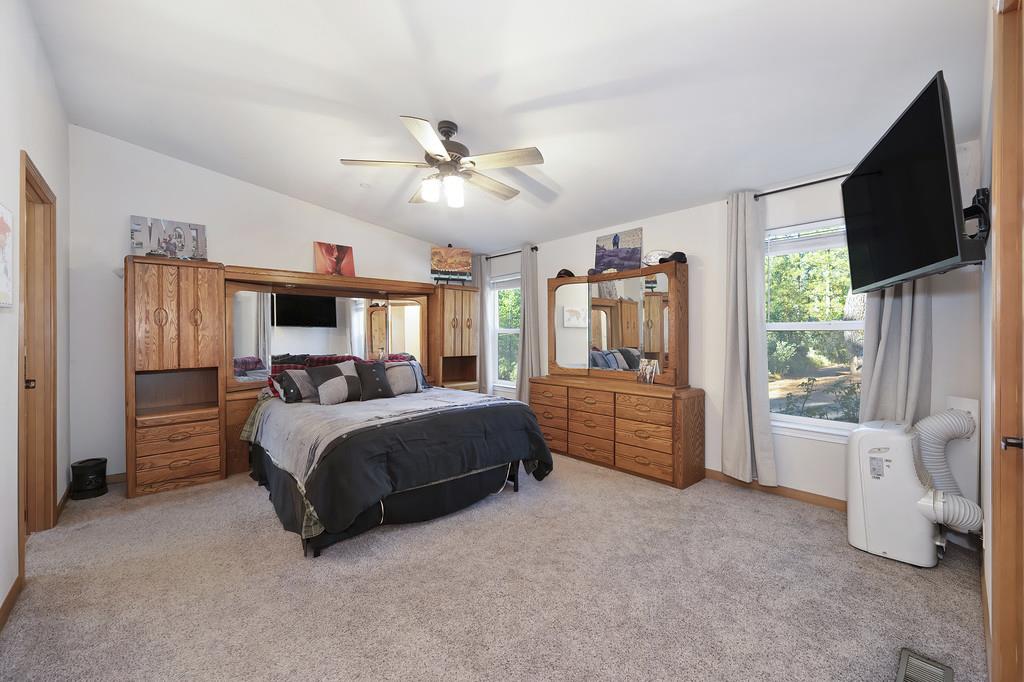 5060 Chestnut Court Georgetown, CA 95634 - Photo 41 of 65 bedroom featuring light colored carpet, a ceiling fan, and lofted ceiling