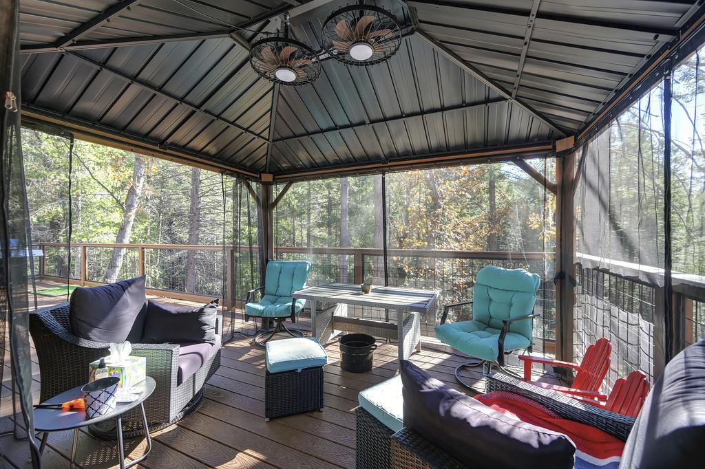 5060 Chestnut Court Georgetown, CA 95634 - Photo 49 of 65 a outdoor living space with patio furniture and a garden