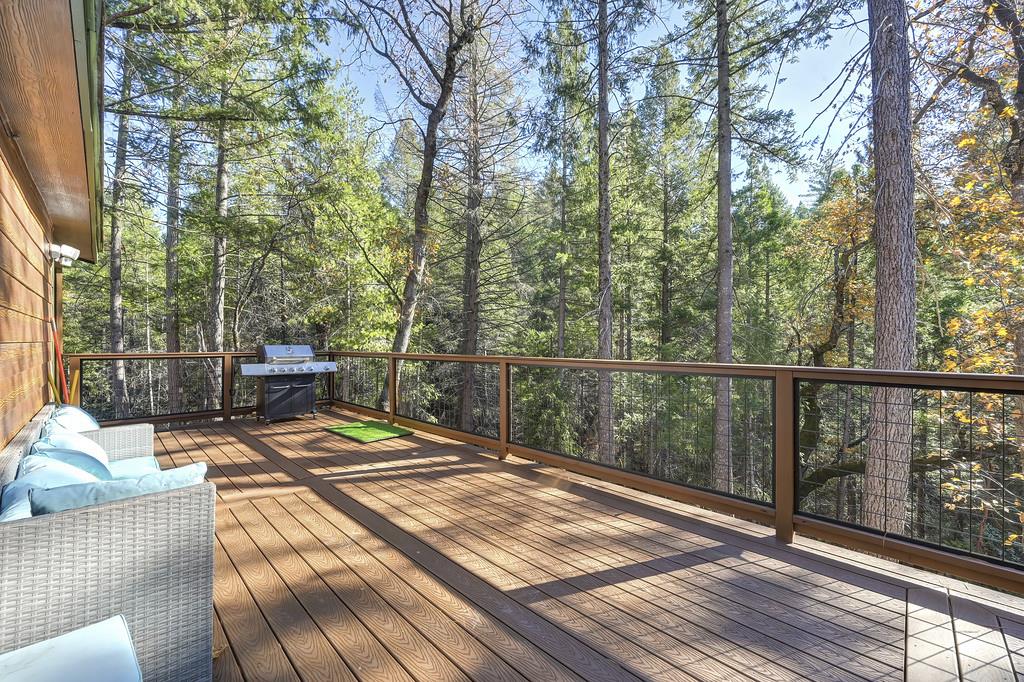 5060 Chestnut Court Georgetown, CA 95634 - Photo 51 of 65 a view of balcony with wooden floor and outdoor seating