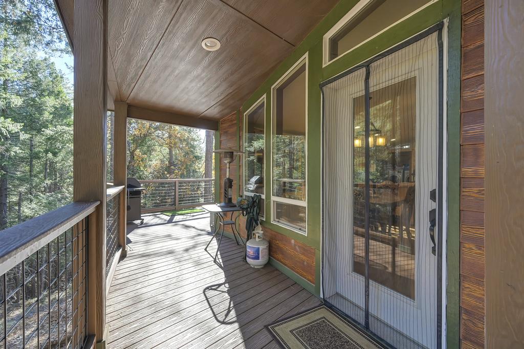 5060 Chestnut Court Georgetown, CA 95634 - Photo 56 of 65 wooden terrace featuring grilling area