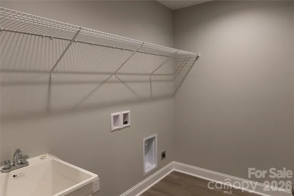 a bathroom with a sink and vanity