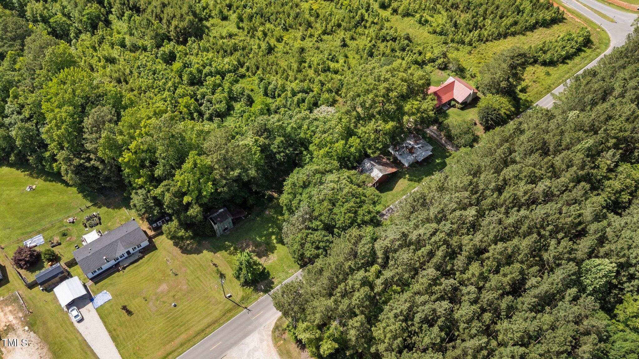 1908 Rocky Cross Road Zebulon, NC 27597 - Photo 4 of 47 4-web-or-mls-DJI_20250523155108_0986_D