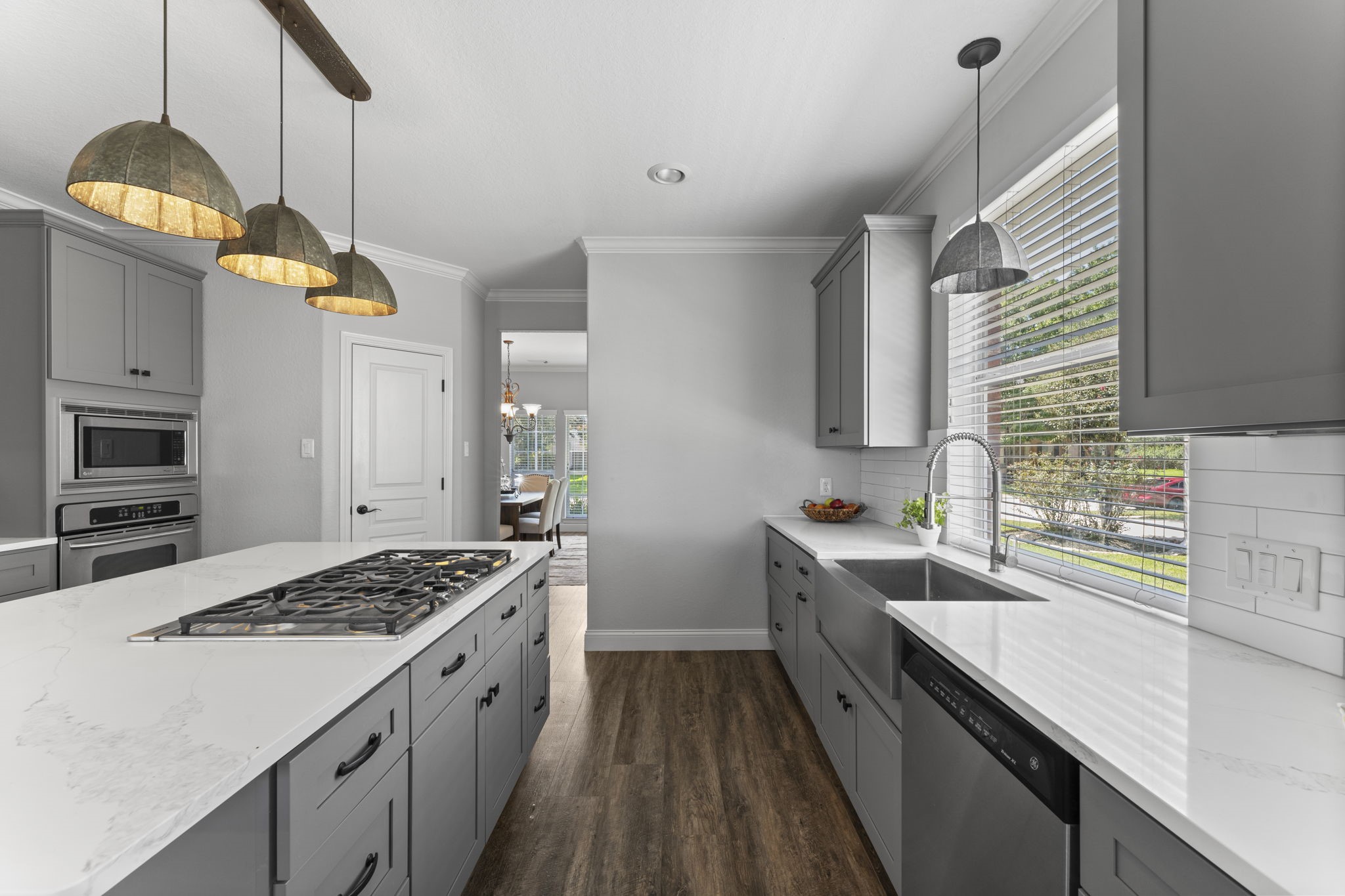 19218 Country Village Drive Spring, TX 77388 - Photo 12 of 30 a kitchen with a sink stove and refrigerator