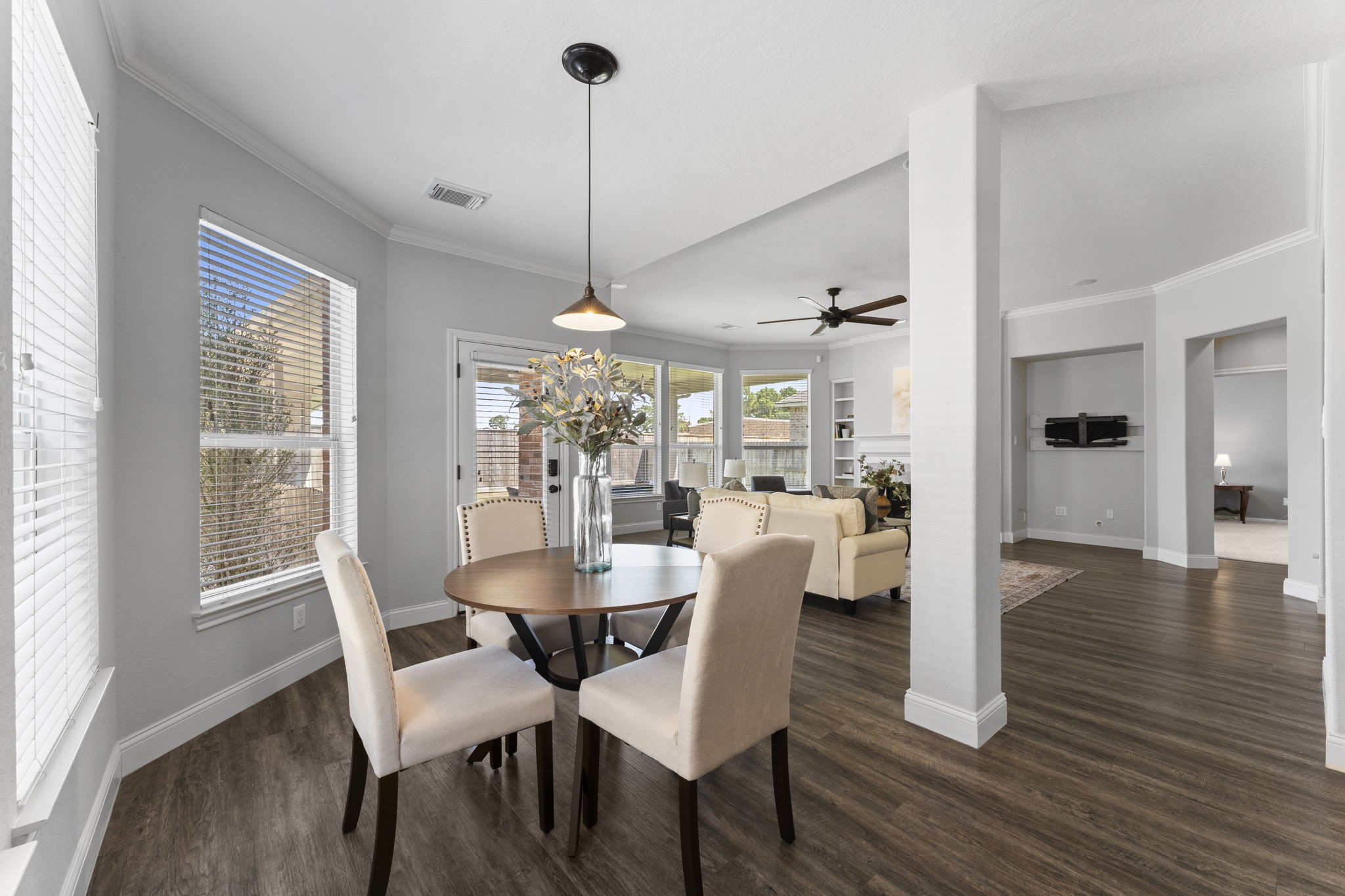 19218 Country Village Drive Spring, TX 77388 - Photo 15 of 30 a view of a dining room with furniture window and wooden floor