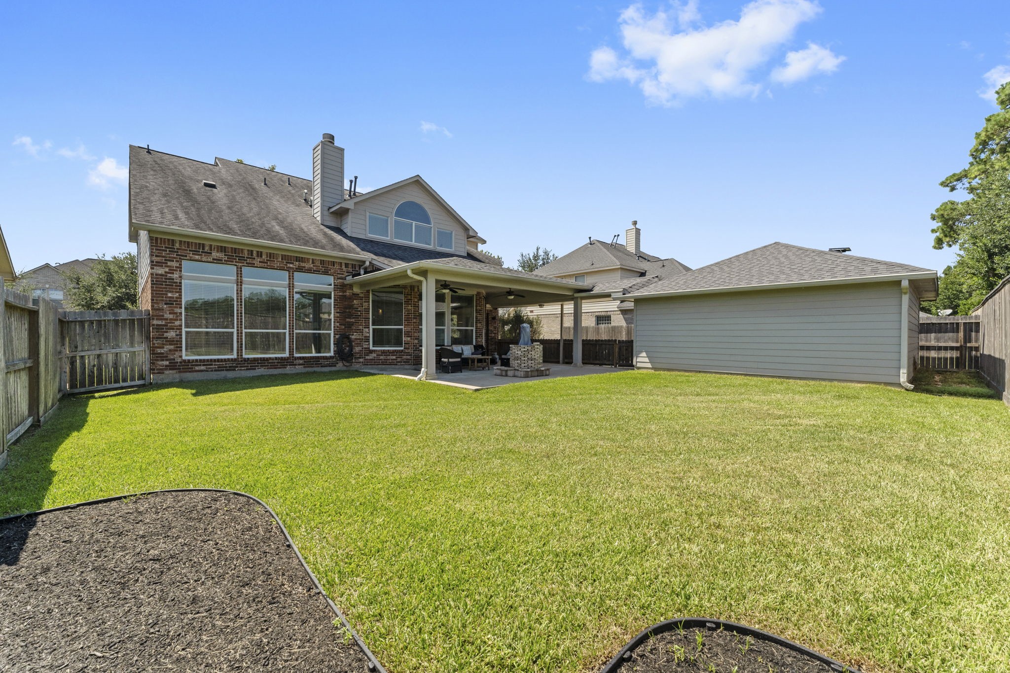 19218 Country Village Drive Spring, TX 77388 - Photo 27 of 30 a front view of a house with a garden