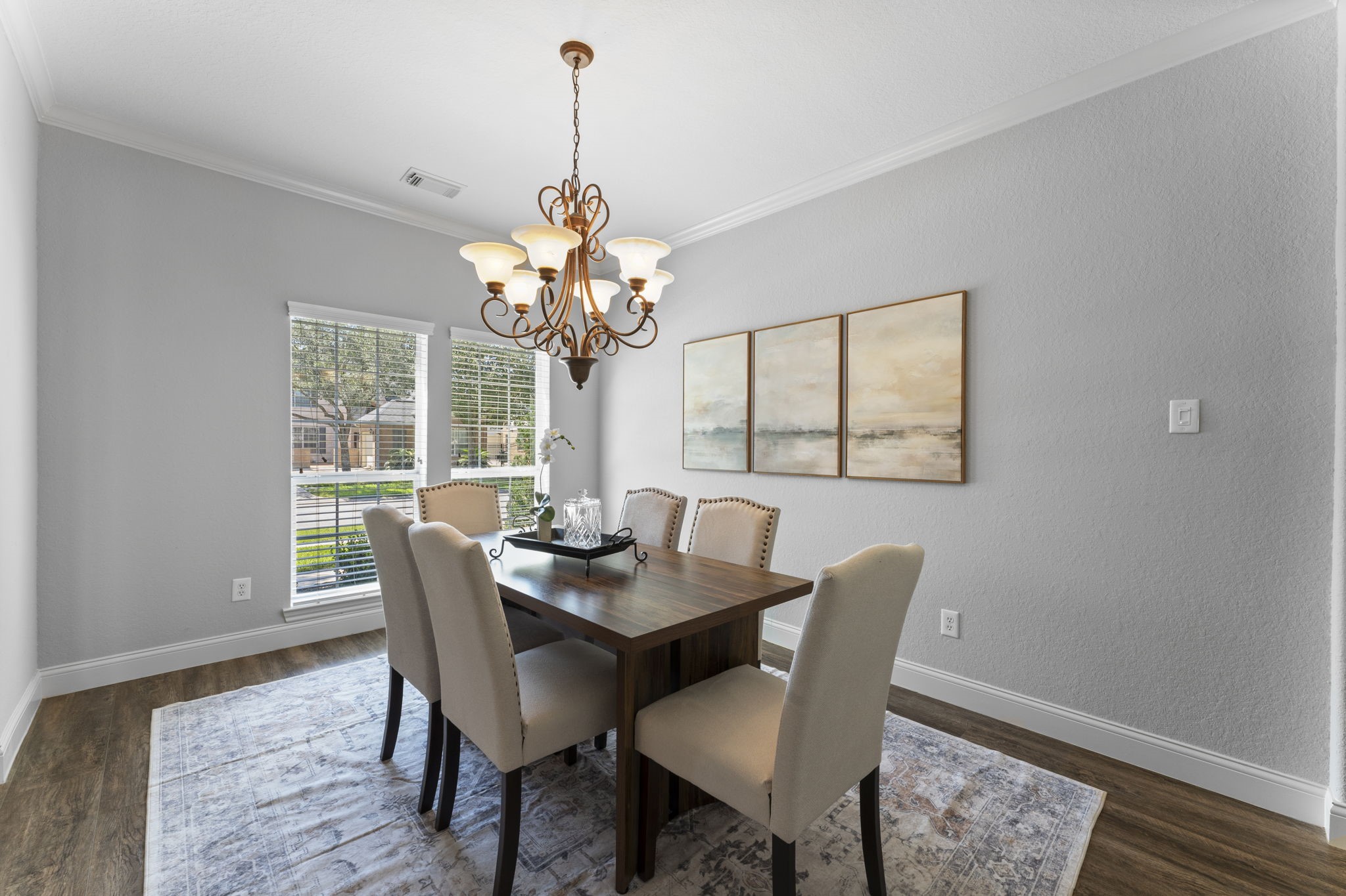 19218 Country Village Drive Spring, TX 77388 - Photo 5 of 30 a dining room with furniture a chandelier and wooden floor