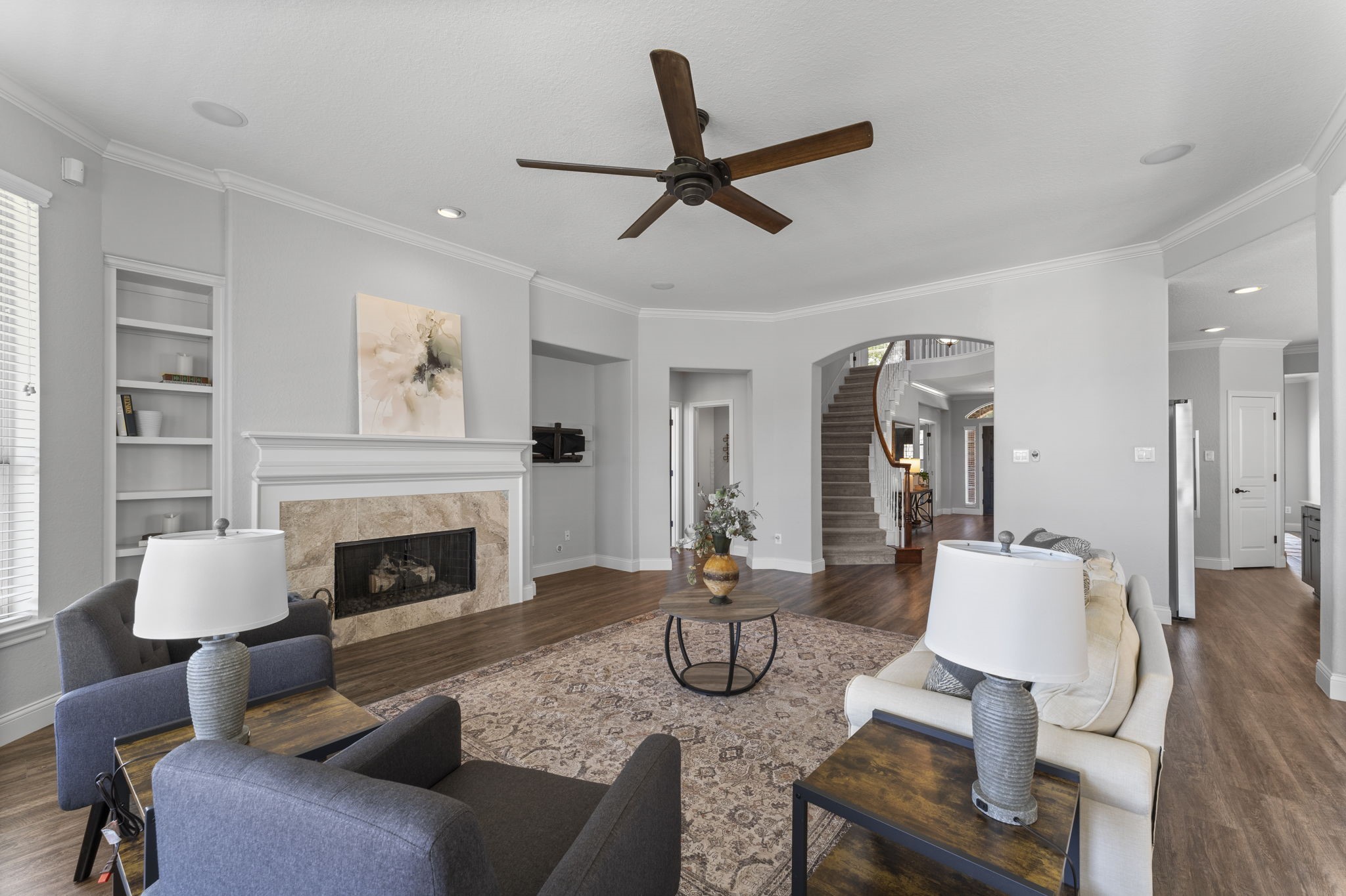 19218 Country Village Drive Spring, TX 77388 - Photo 9 of 30 a living room with furniture and a fireplace
