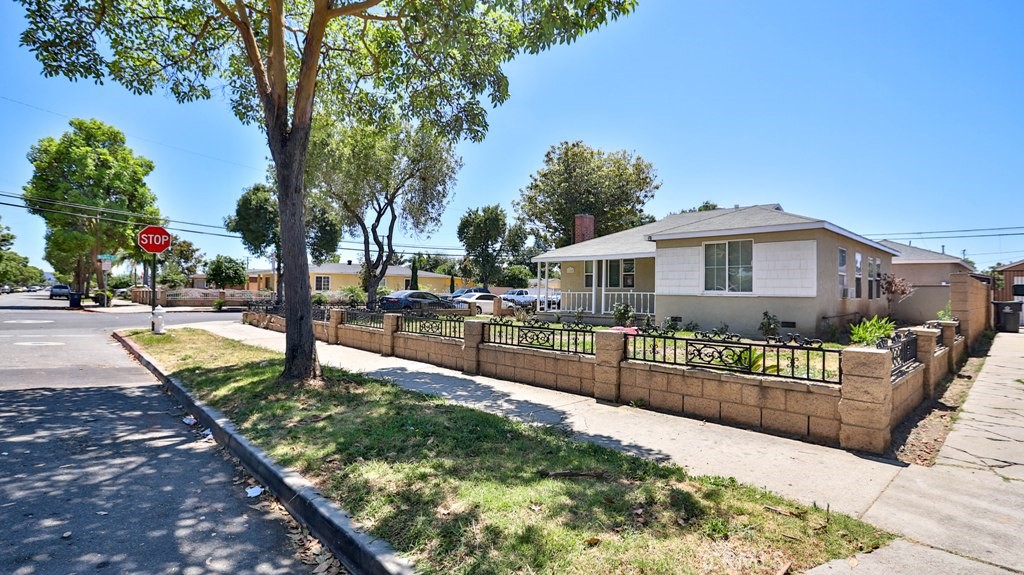 1246 South Baker Street Santa Ana, CA 92707 - Photo 2 of 19 a view of a house with swimming pool and sitting area