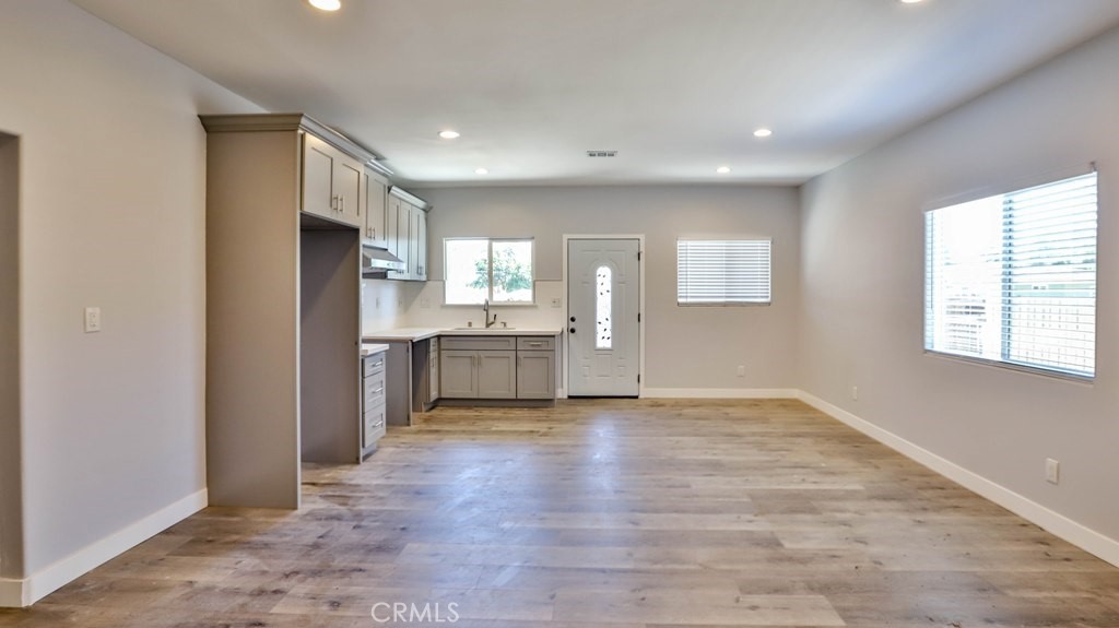 1246 South Baker Street Santa Ana, CA 92707 - Photo 8 of 19 a view of kitchen with wooden floor