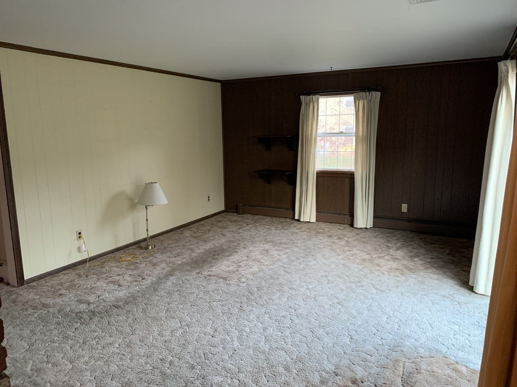 144 Harvard Road Stow, MA 01775 - Photo 16 of 40 an empty room with windows