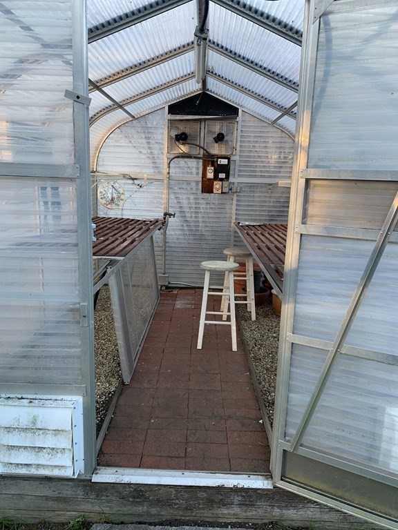 144 Harvard Road Stow, MA 01775 - Photo 29 of 40 a view of a balcony with wooden floor