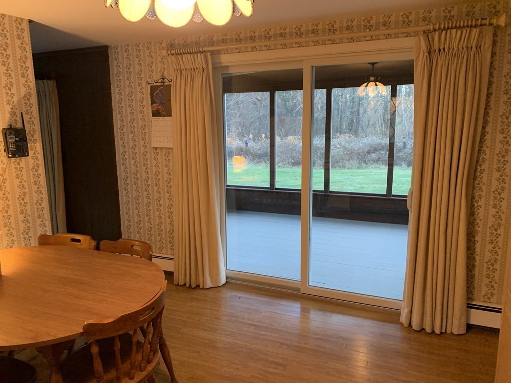 144 Harvard Road Stow, MA 01775 - Photo 9 of 40 wooden floor in an empty room with a window