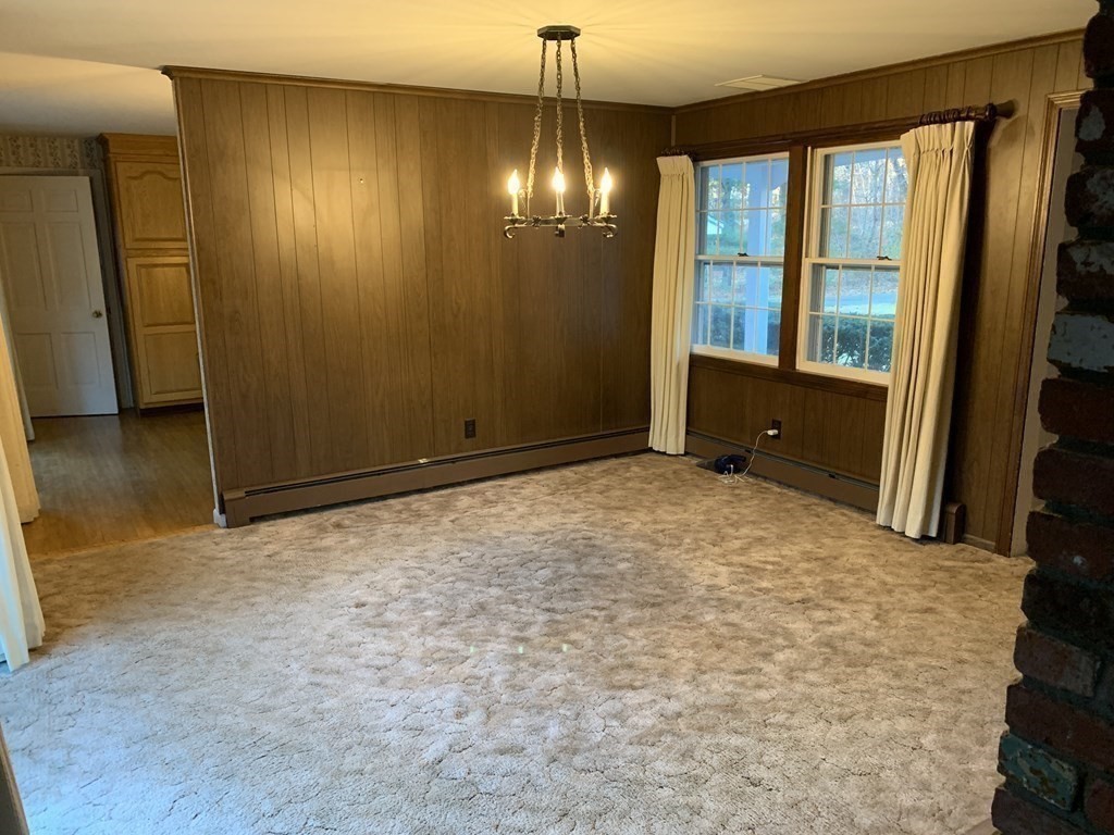 144 Harvard Road Stow, MA 01775 - Photo 10 of 40 a view of an empty room with window and bathroom