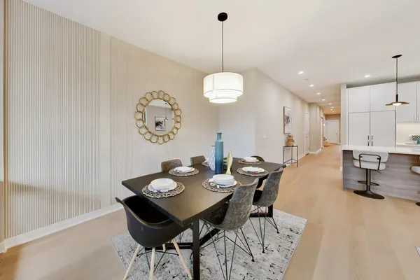 a bedroom with furniture and gym equipment