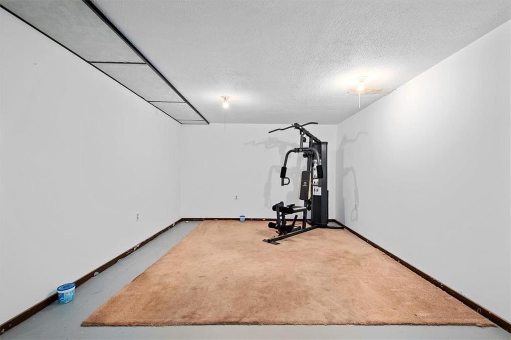 203 Myers Road Vandergrift, PA 15690 - Photo 18 of 25 a view of a room with gym equipment