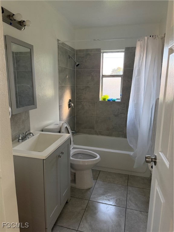 1126 Florida Avenue Clewiston, FL 33440 - Photo 7 of 13 a bathroom with a sink toilet and shower