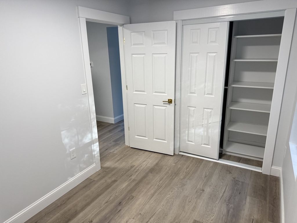 27 Leicester Street, Unit 1 Oxford, MA 01537 - Photo 20 of 26 a view of wooden floor