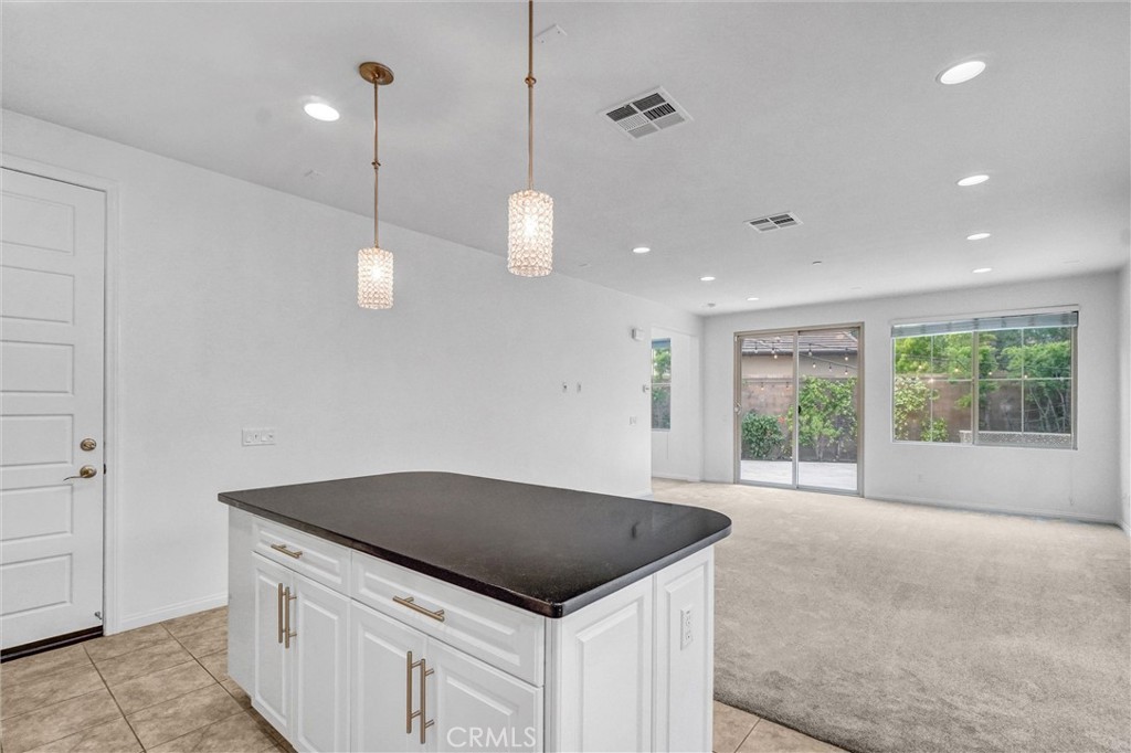 54 Visionary Irvine, CA 92618 - Photo 12 of 39 a kitchen with a stove and a large window