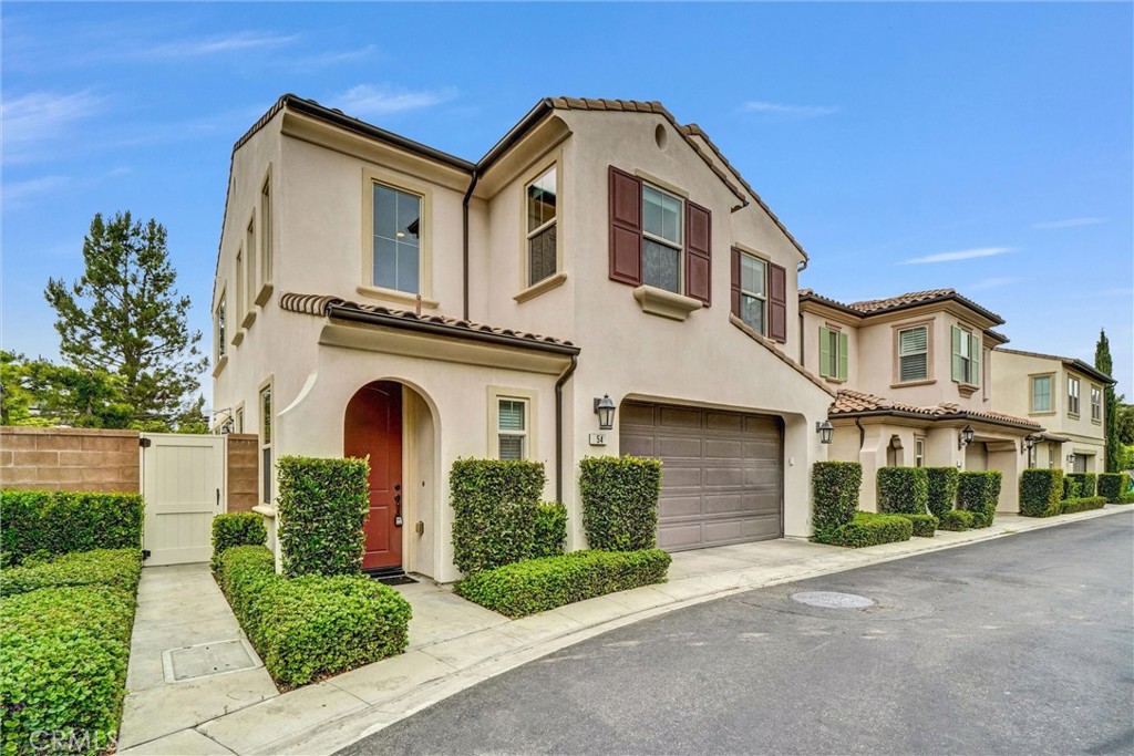 54 Visionary Irvine, CA 92618 - Photo 3 of 39 a front view of a house with garden
