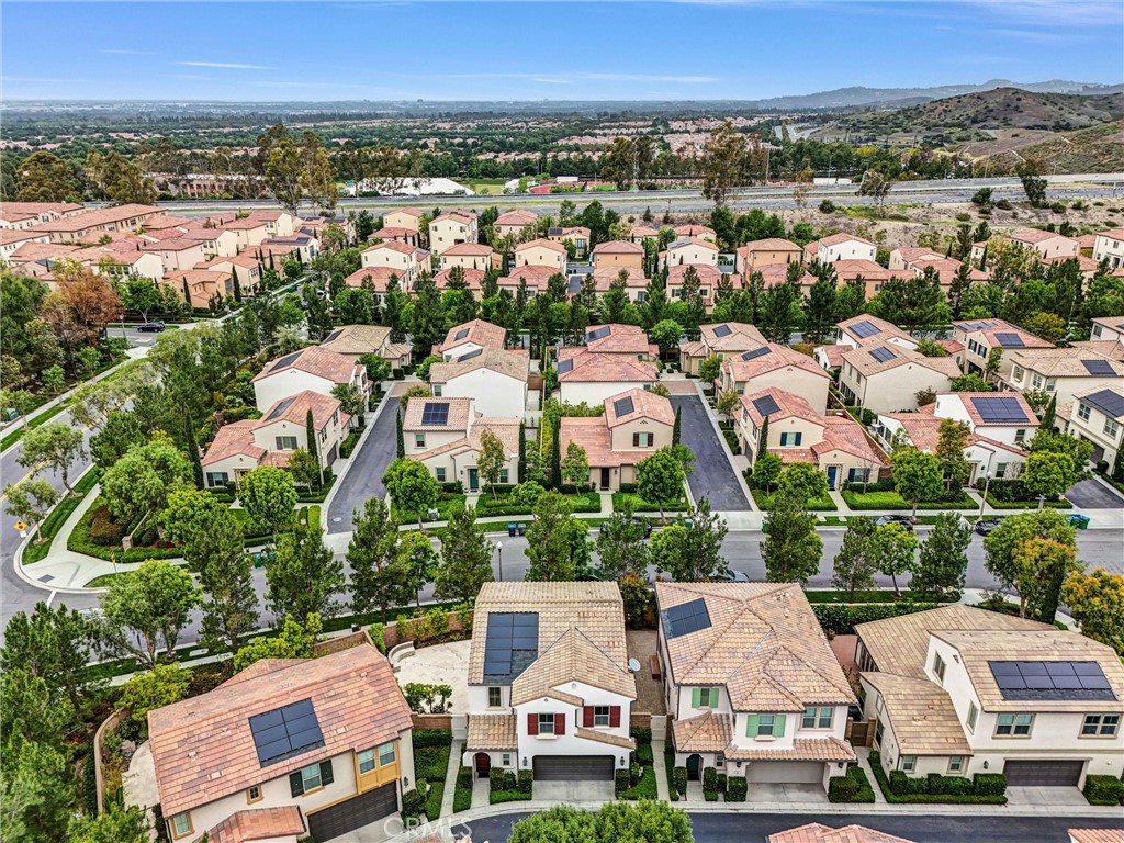 54 Visionary Irvine, CA 92618 - Photo 34 of 39 an aerial view of residential houses with outdoor space and street view
